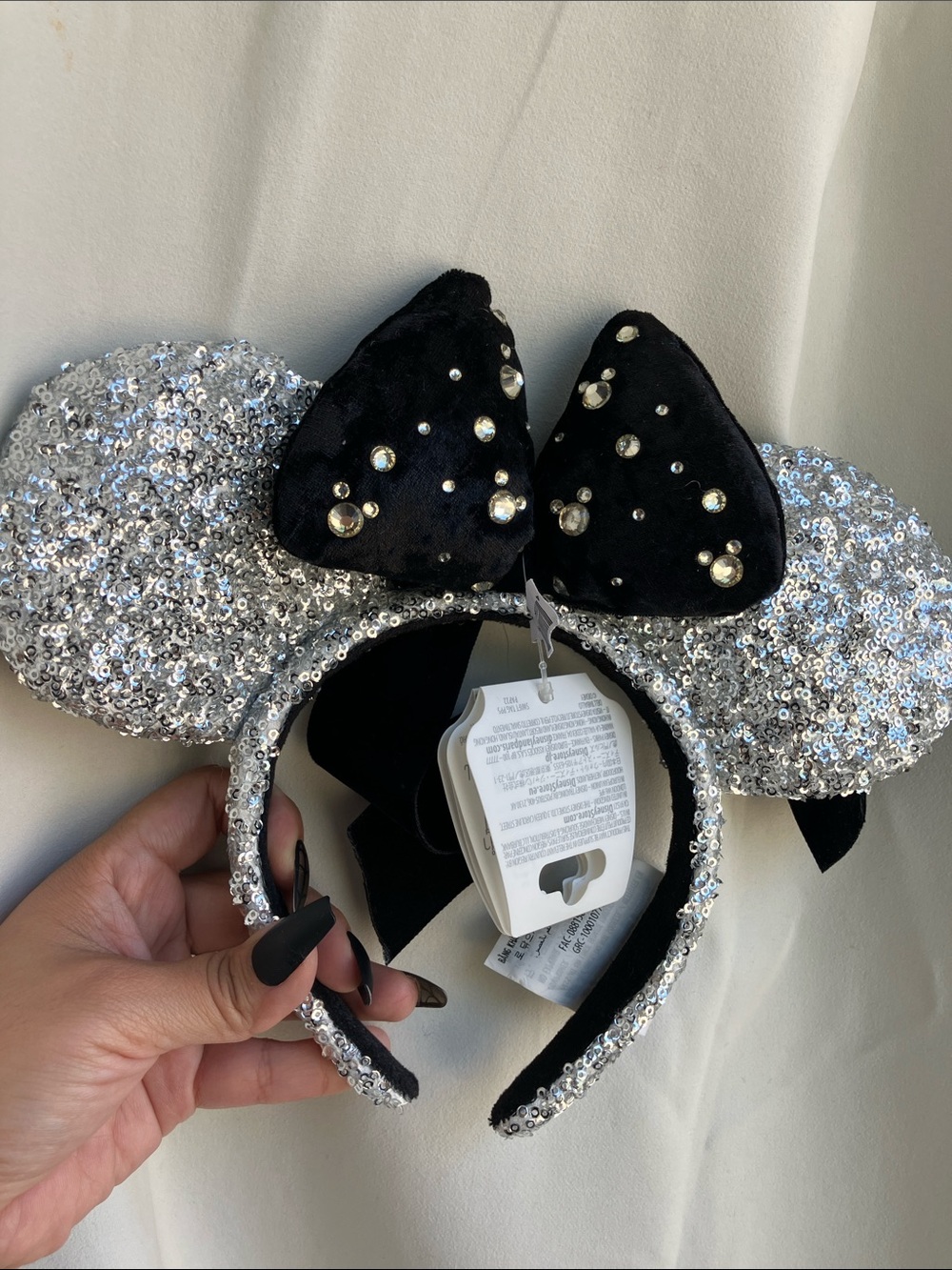 Disney Silver Sequin Minnie Ears Headband with Black Jeweled Bow